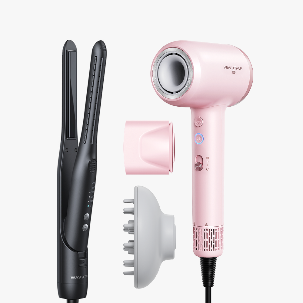 Pink Turblow Pro and black Cool Curl Pencil with attachments on a white background