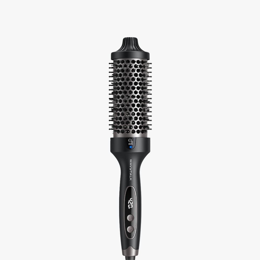 Black Blowout Boost Grande with bristle head and cylindrical design on a white background