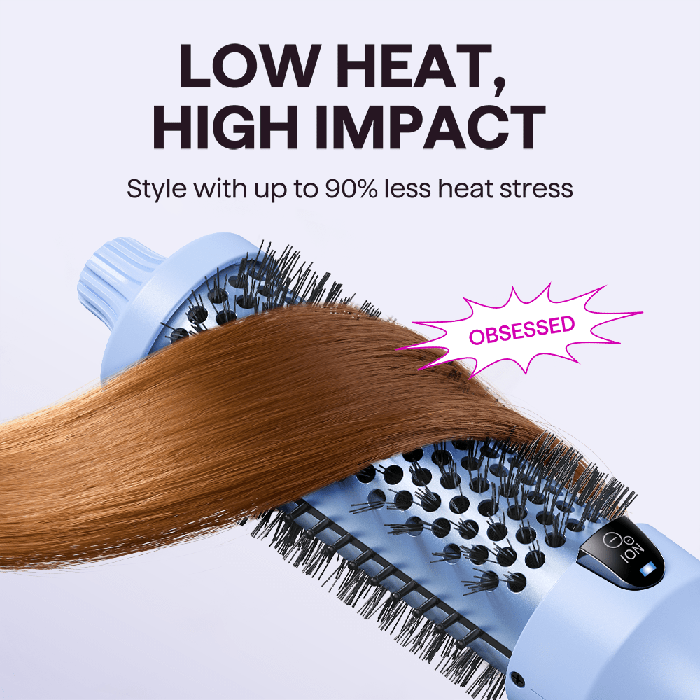 Light blue Blowout Boost thermal brush with hair, highlighting 'Low Heat, High Impact' feature on a light purple background.