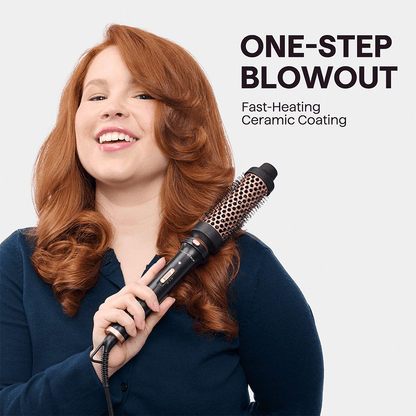 Woman using Pink Multi Curl 5 in 1 with text 'One-Step Blowout' on a light gray background