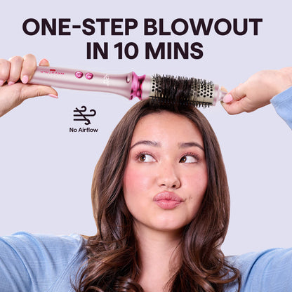 Woman using a Pink Heatwave Pro hair styling tool with text 'One-Step Blowout in 10 Mins' on a light gray background