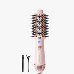 Pink hair styling tool with attachments on a white background