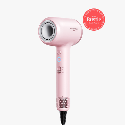 Pink Turblow Pro hair dryer with 'Bustle' beauty award badge on a white background