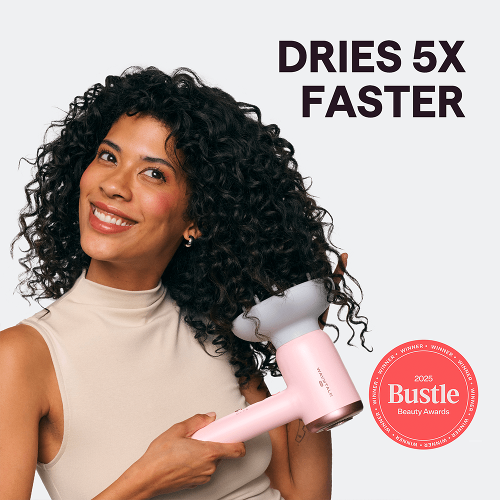 Woman with curly hair holding a pink Turblow Pro hair dryer with 'Dries 5x Faster' text and Bustle Beauty Award badge.